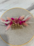 Peigne rose et blanc Rêves En Fleurs avec dents larges pour démêler les cheveux en douceur.